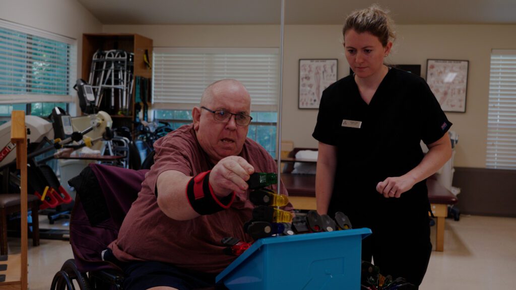 A man doing physical therapy at a short term care facility